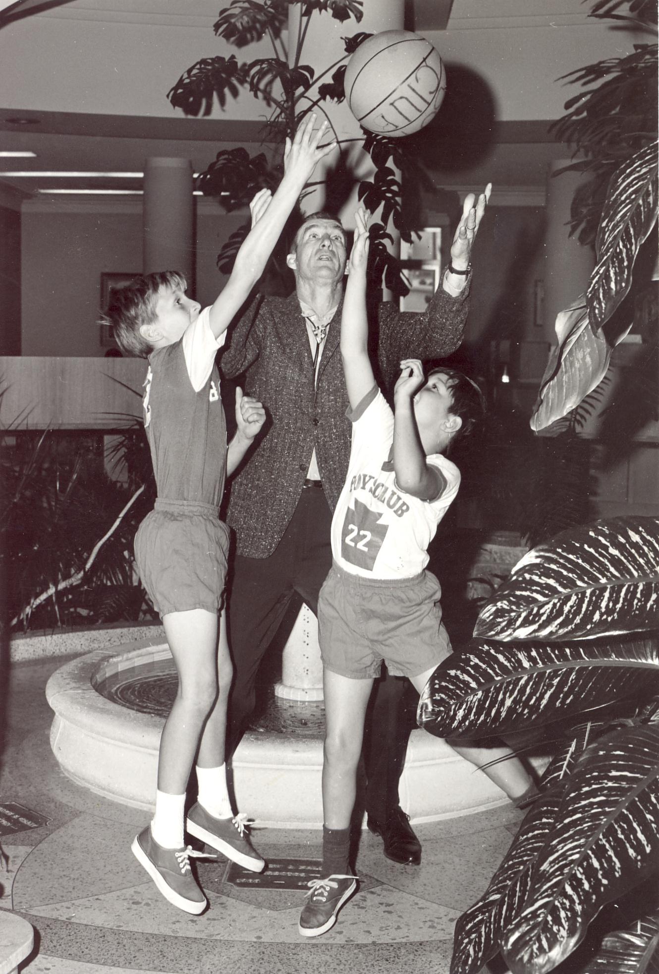 Historic 1967 promo photo of boys basketball tipoff inside the Wells Fargo building on Ocean Ave. in Laguna Beach