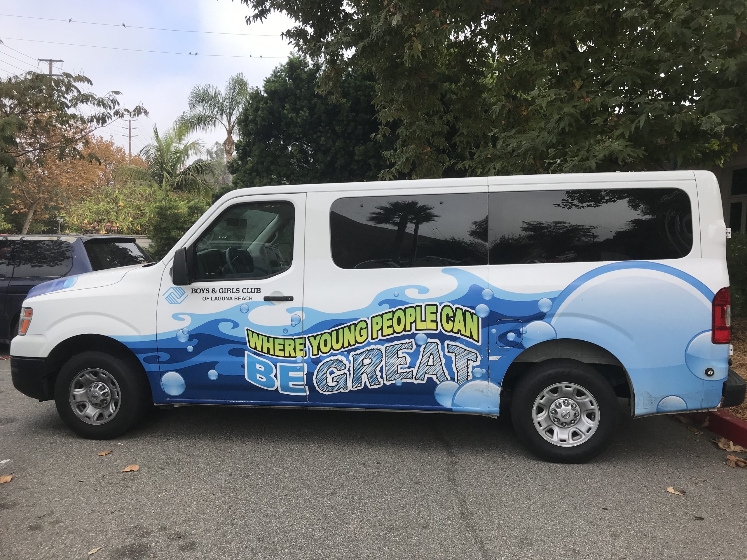 New Boys & Girls Club custom wrapped passenger vans