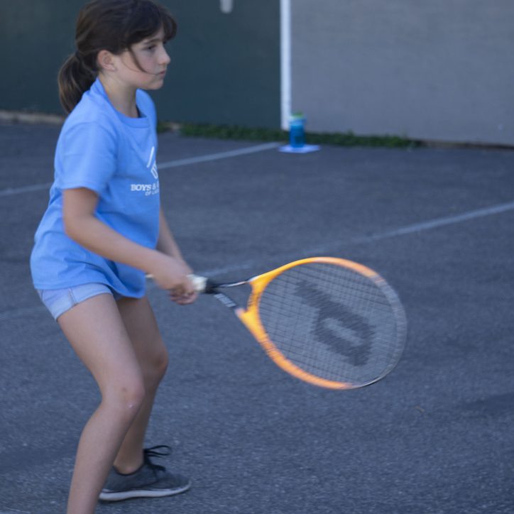 Girl playing tennis